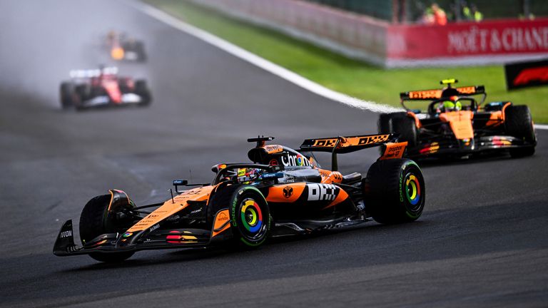 Oscar Piastri and Lando Norris battling at the 2025 Belgian Grand Prix at Spa-Francorchamps