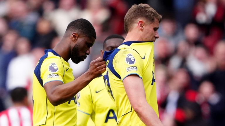 Tottenham Hotspur's Kevin Danso (left) and Micky van de Ven leave the pitch after defeat to Sunderland