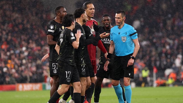 PSG players argue against the decision to award Liverpool a penalty